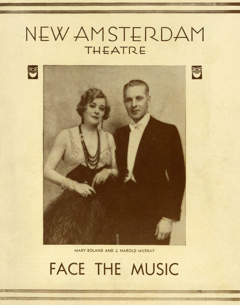 A theatre program cover depicting a man and woman wearing black tie apparel.
